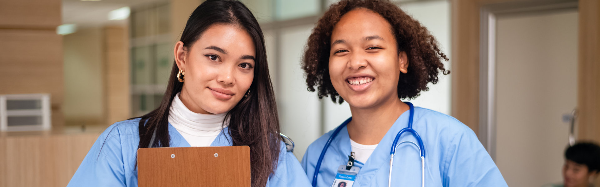 two nurses smiling